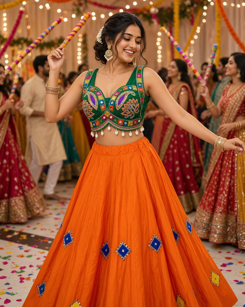 Orange Mirror Work Lehenga with Green Embroidered Blouse