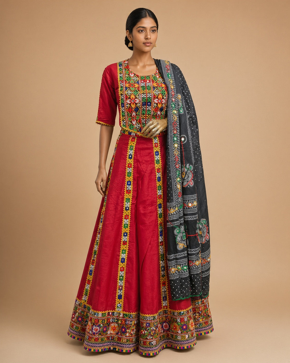 Red Panelled Lehenga with Kutch Yoke Blouse & Black Dupatta – complete set, front view on model